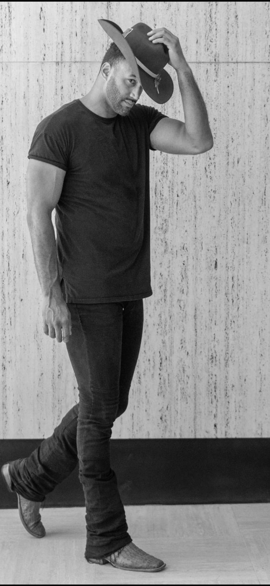 Myles Luttman, Founder of PROJECT:ONE, full length portrait
